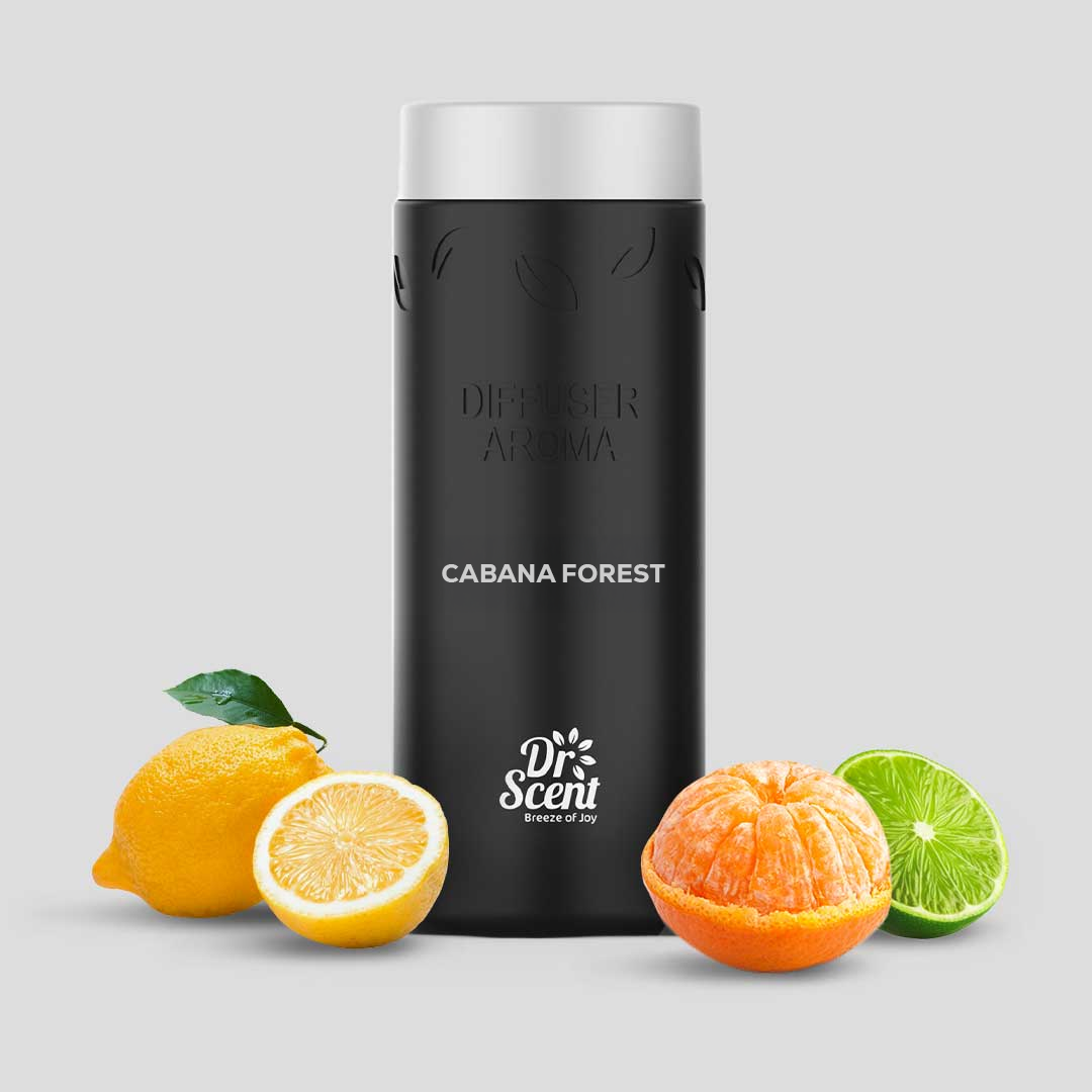 Pouring Cabana Forest diffuser aroma oil refill into a black Dr Scent bottle